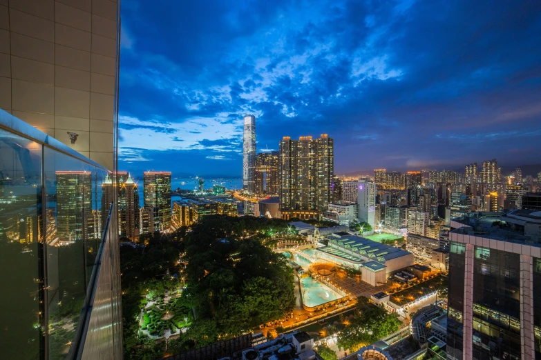 the view of downtown at night from one of the top floors in a building