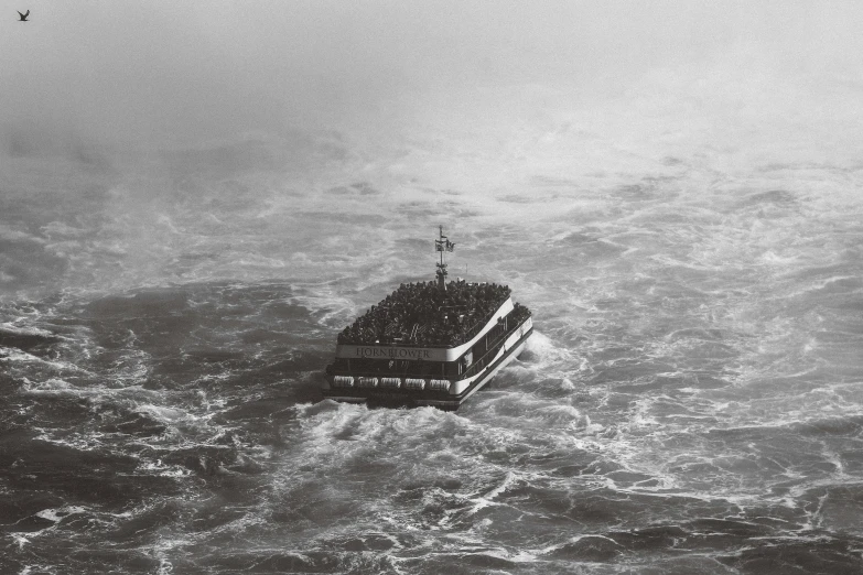 a boat in some very big choppy waves