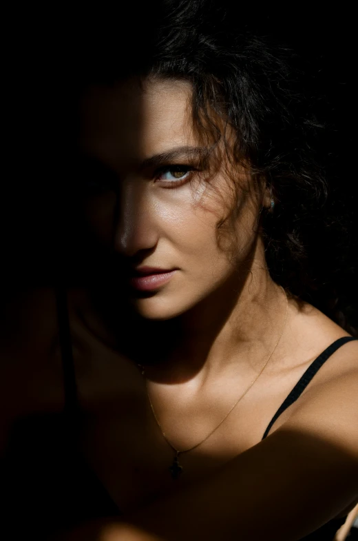 a woman looking away with a wet face