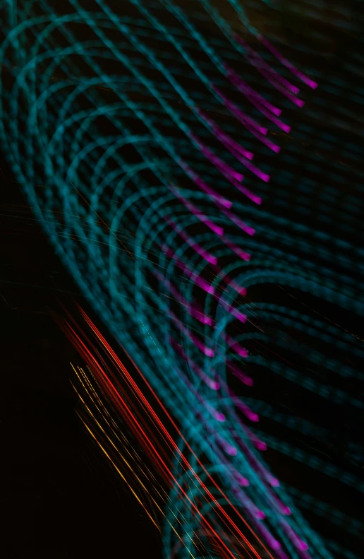 abstract view of colored lines and wires in motion