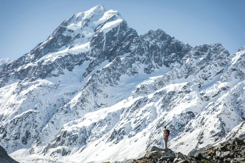 there is a mountain that is covered with snow