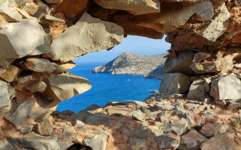 there is an image through a window of rocks