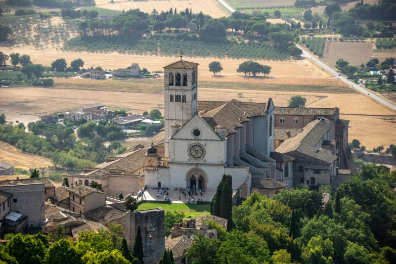 the view from the hills shows a cathedral with towers