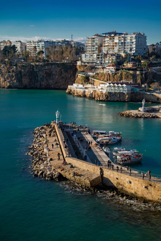 there is an aerial s of several boats in the harbor