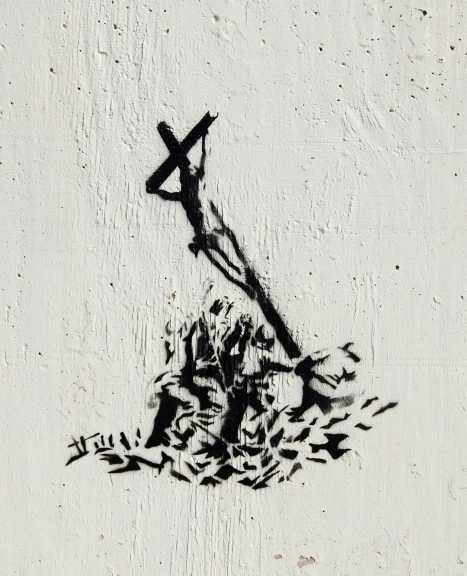 a drawing of a cross and a person climbing up a mountain