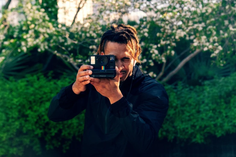 man taking self portrait while looking in camera