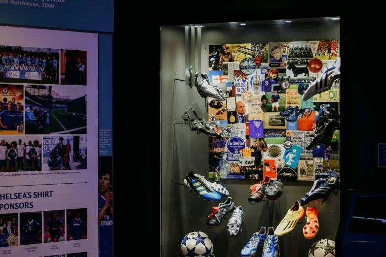 soccer memorabilia in the exhibit case and pictures on display