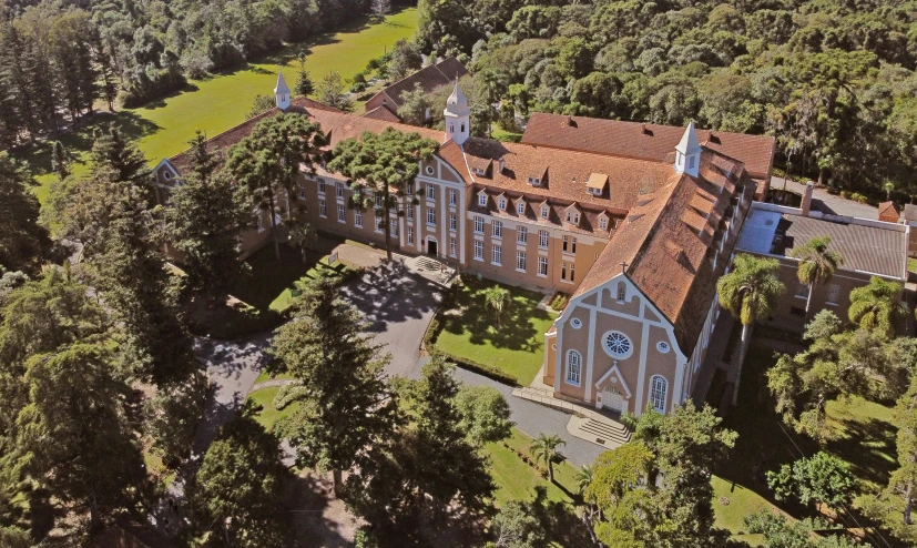 a huge building is next to some trees