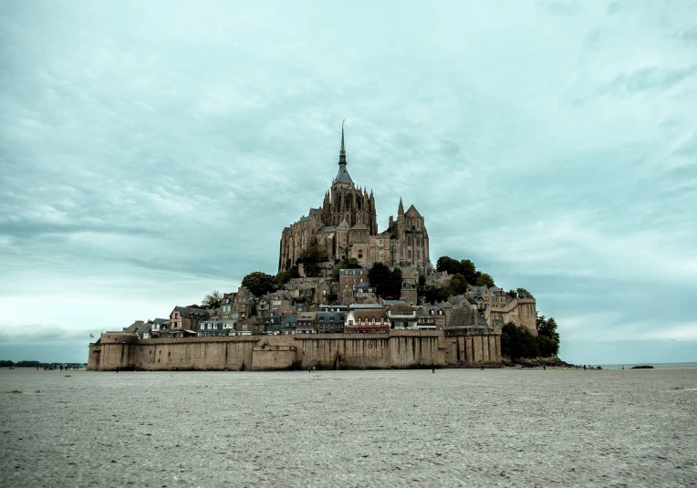 a large castle on top of a beach