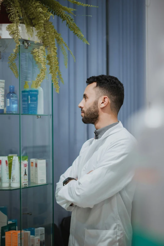 a bearded man is looking in the mirror