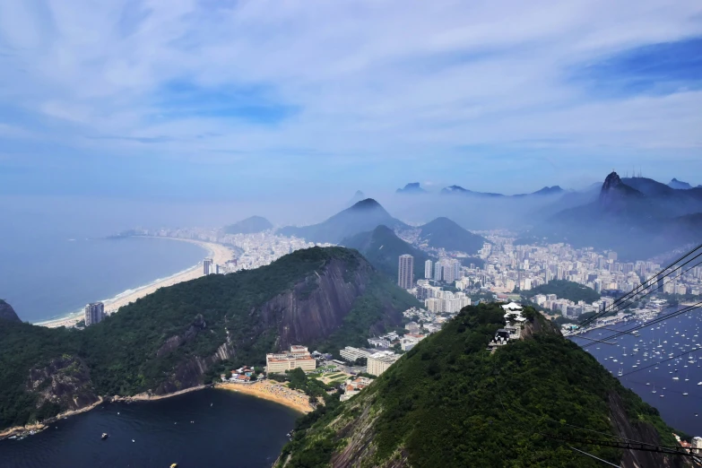 the aerial view of a city from above, looking down on a hill