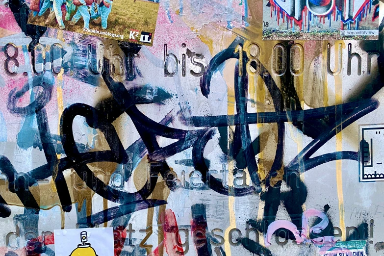 an image of a group of graffiti on the wall