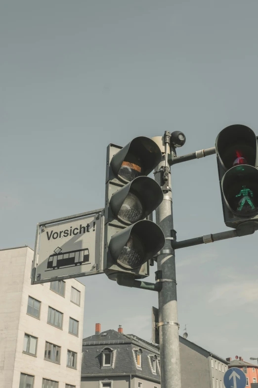 two traffic lights at the intersection are red
