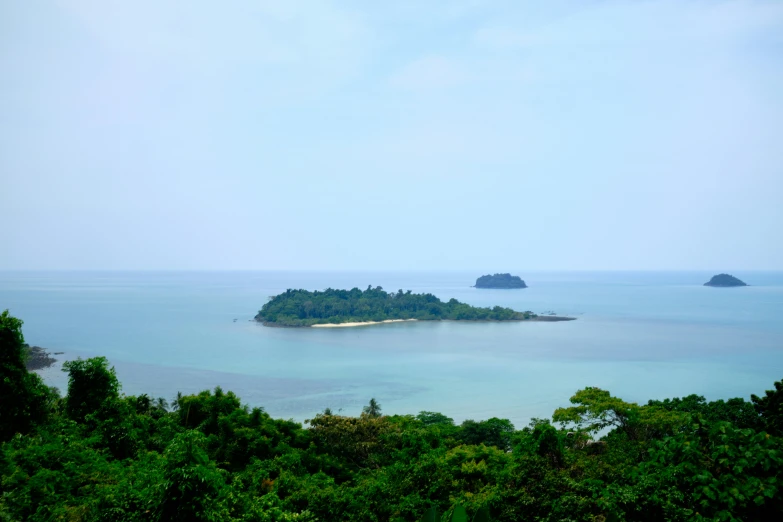 two small islands in the middle of a body of water