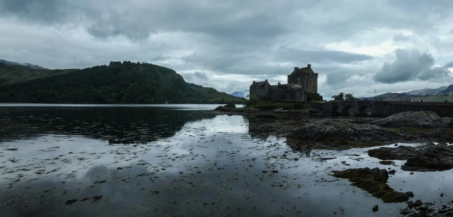 an image of some very old building near water