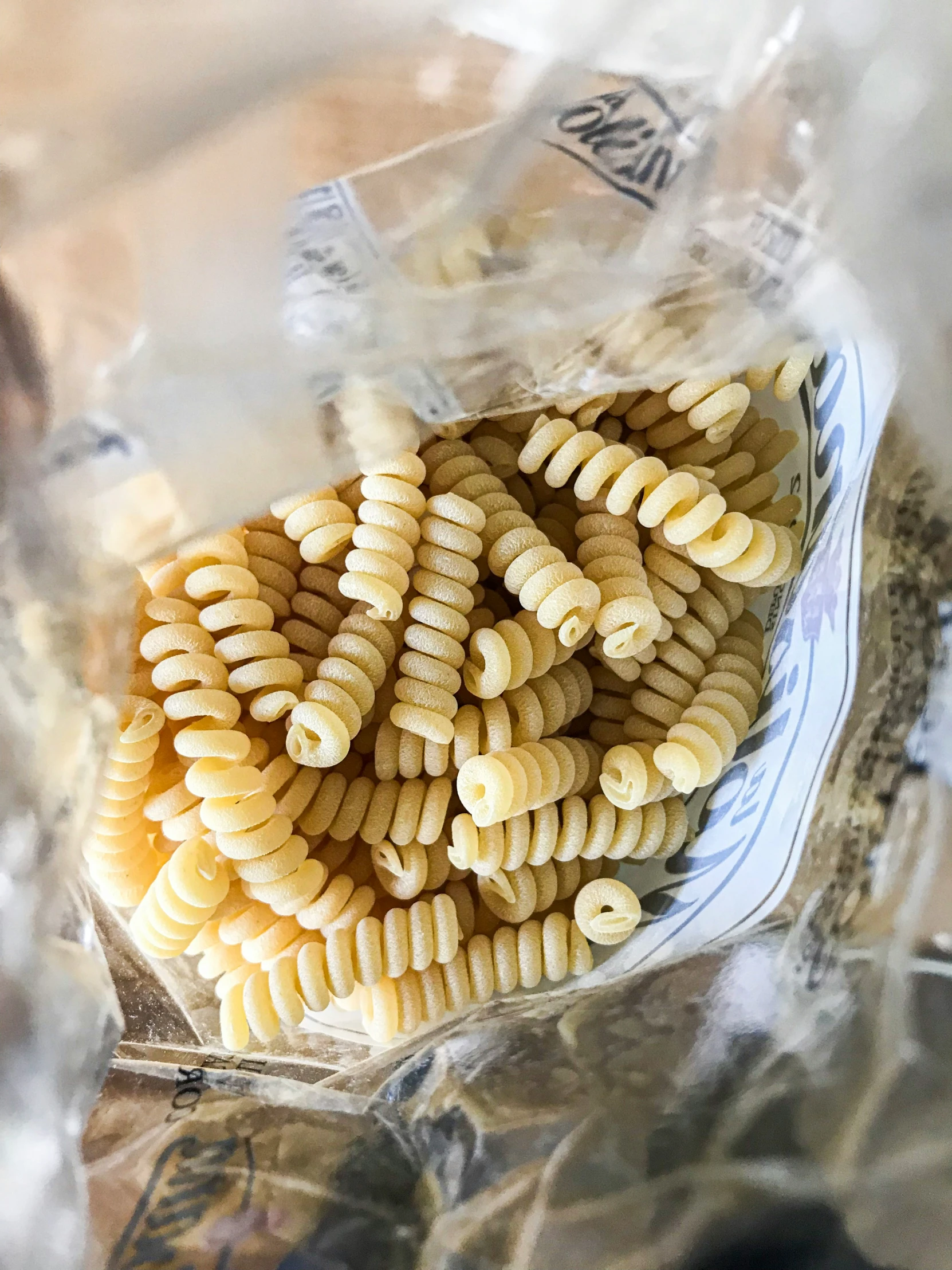 a bag filled with pasta sitting on top of a counter