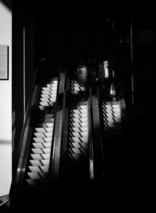 shadows on the stairs leading to an elevator