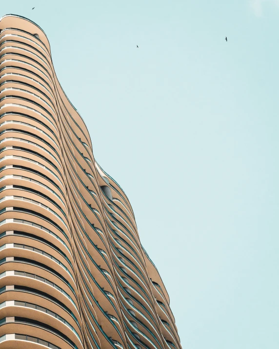 the top of a building with multiple circular balconies