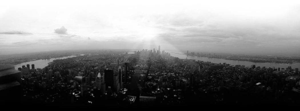 a black and white po of the sun above new york