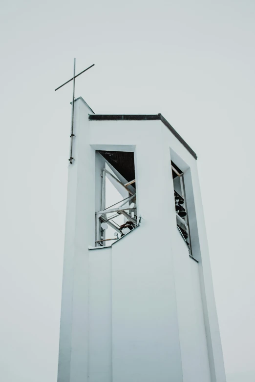 the building has two windows with bars running down the side