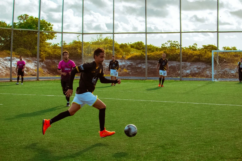 soccer players during a match in the field