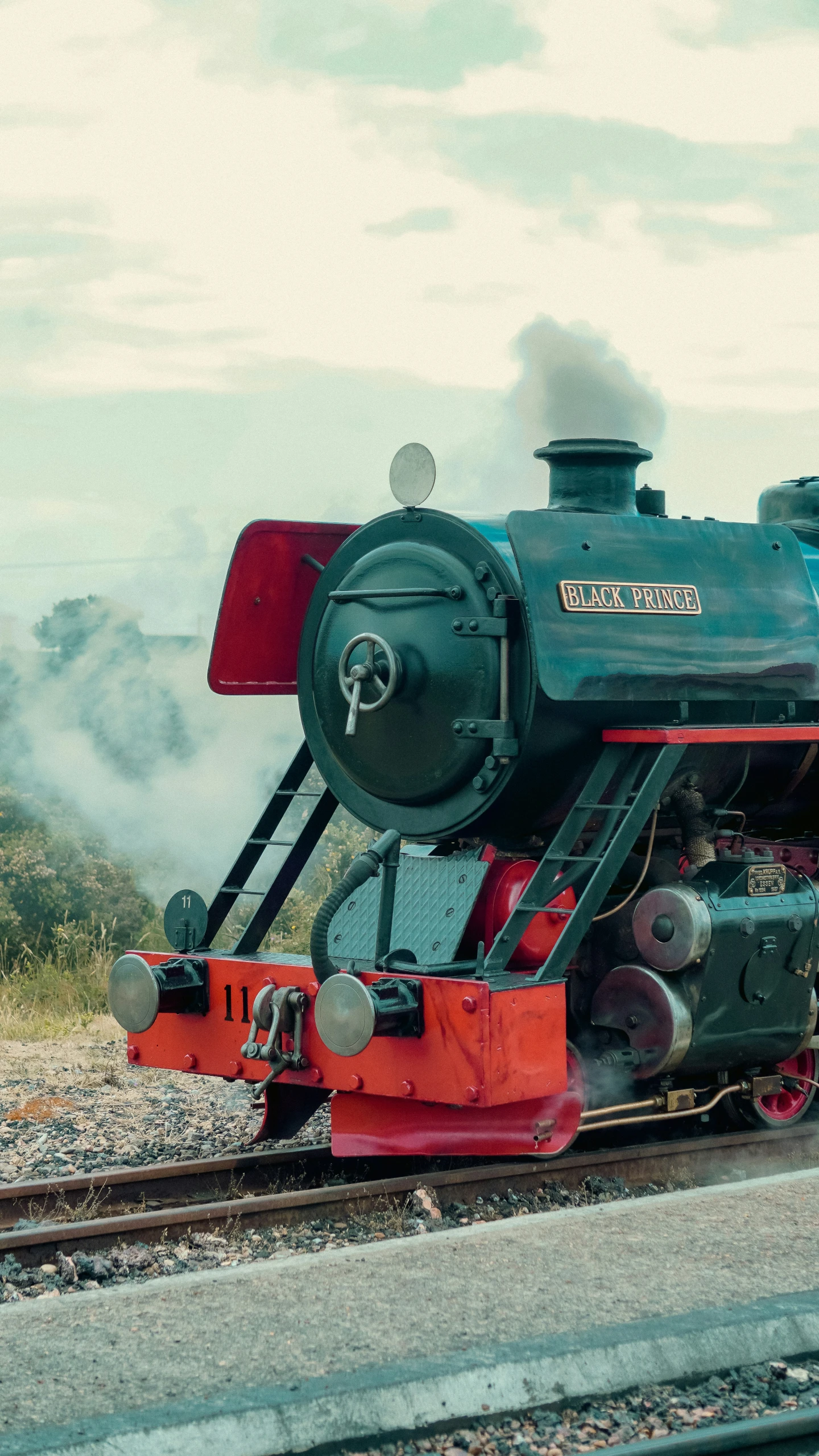 an old train is sitting on the tracks