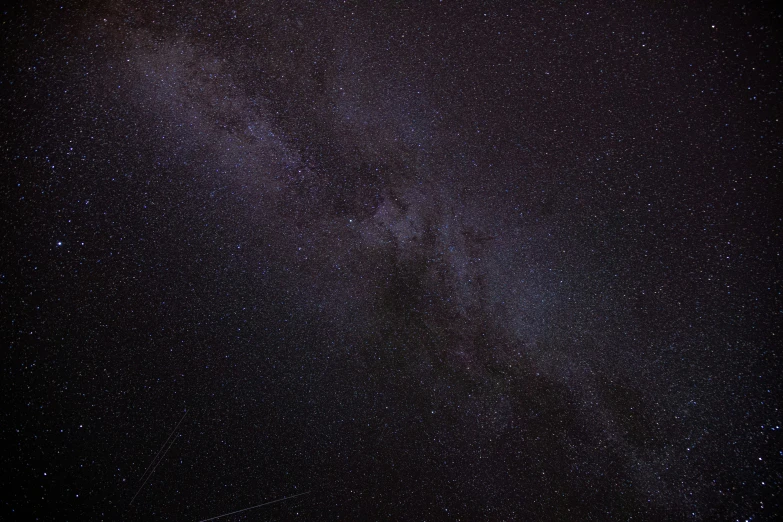 a sky view of the night time and stars