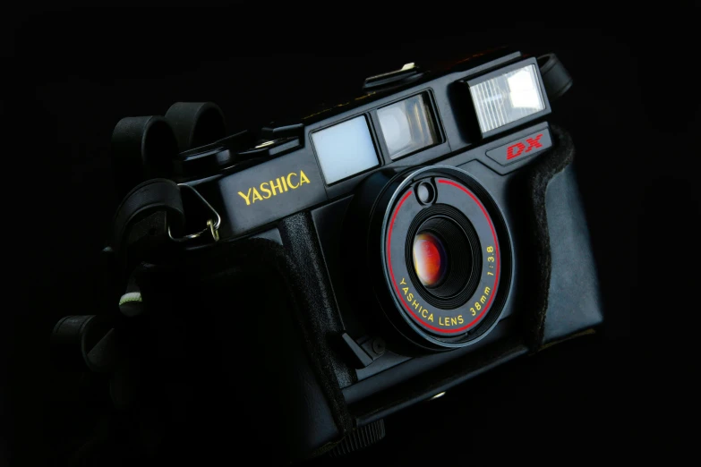 an old fashioned camera on a black background