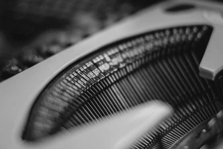 a black and white po of the bottom of an old fashioned typewriter