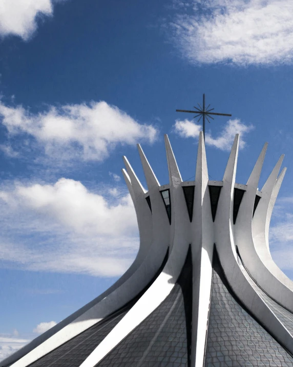 an image of a church's top against a blue sky