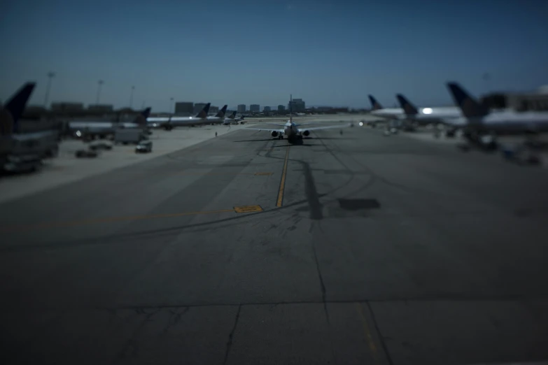 a passenger jet is on the tarmac at an airport