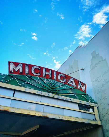 a sign on the side of a building that says michigan