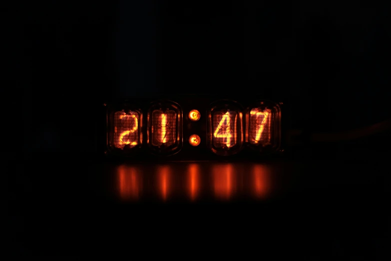 a digital clock that reads 74 minutes, on a black background