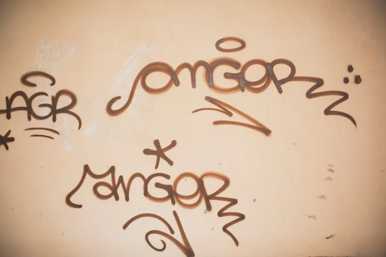 an image of graffiti writing in an outdoor setting