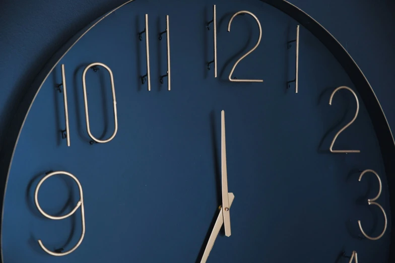 there is an image of a large blue clock
