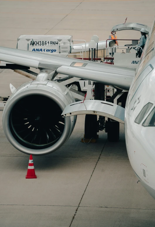 the side view of an airplane with engine exposed