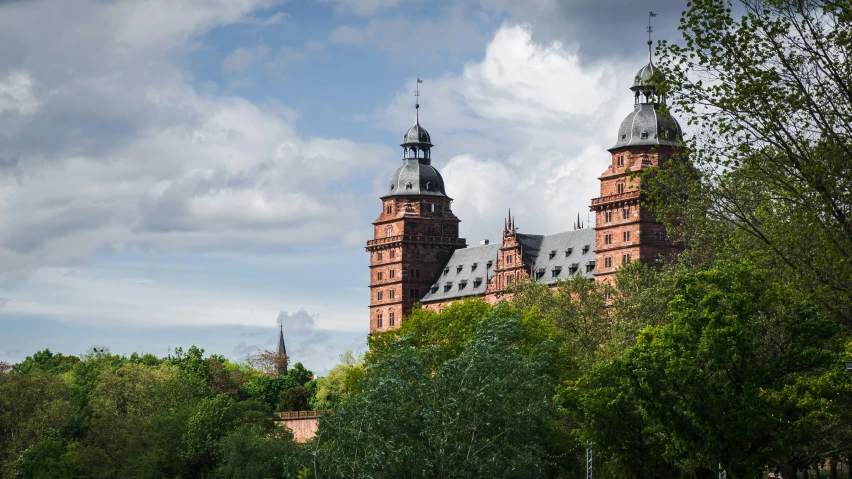 a very big building with a lot of spires in front