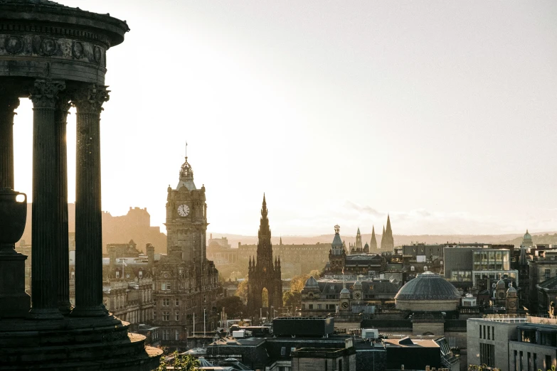 a large city in the daytime with a clock tower