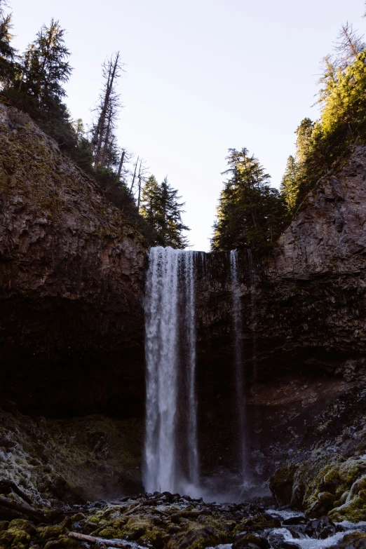 a large waterfall is shown, it appears to be falling