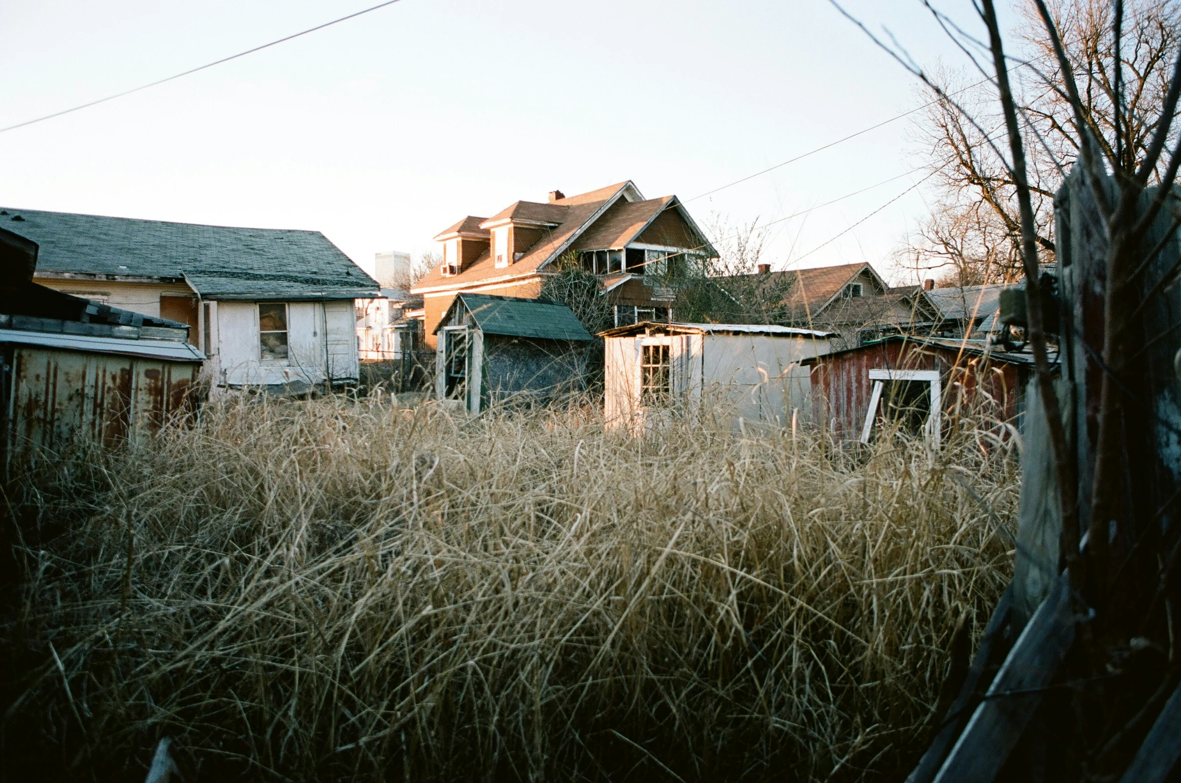 a picture of an old house and its grass