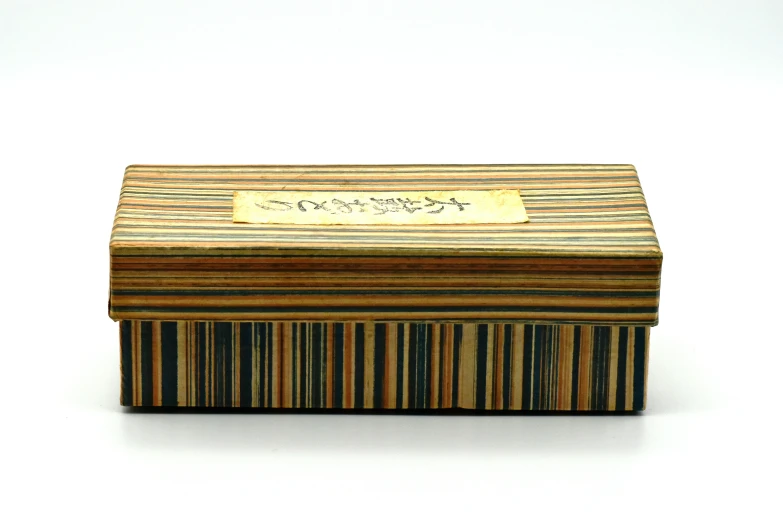 a very nice looking wooden box with some writing on it