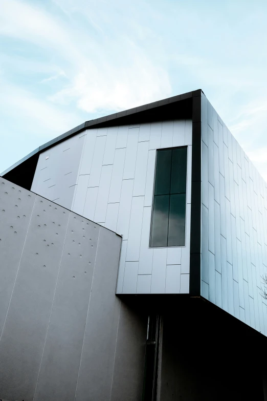 the outside view of a structure with a metal roof