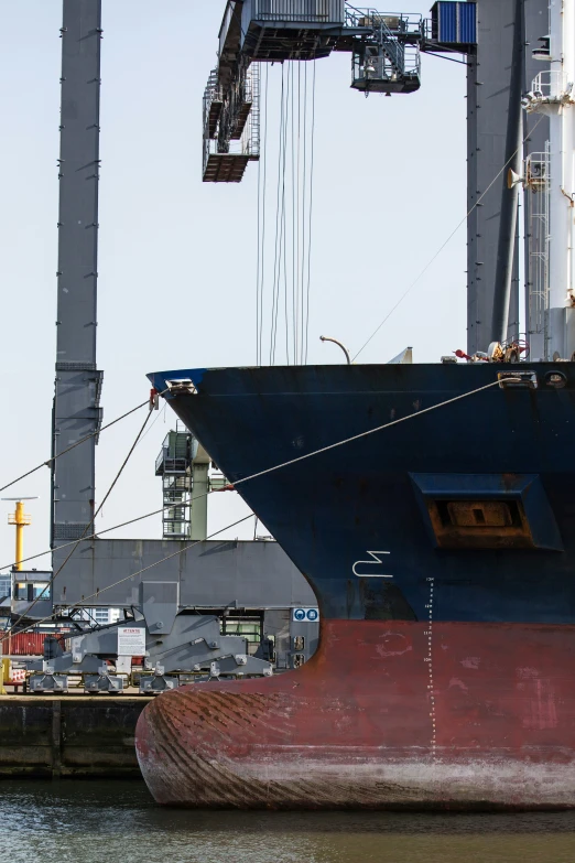 a large ship is docked in the water