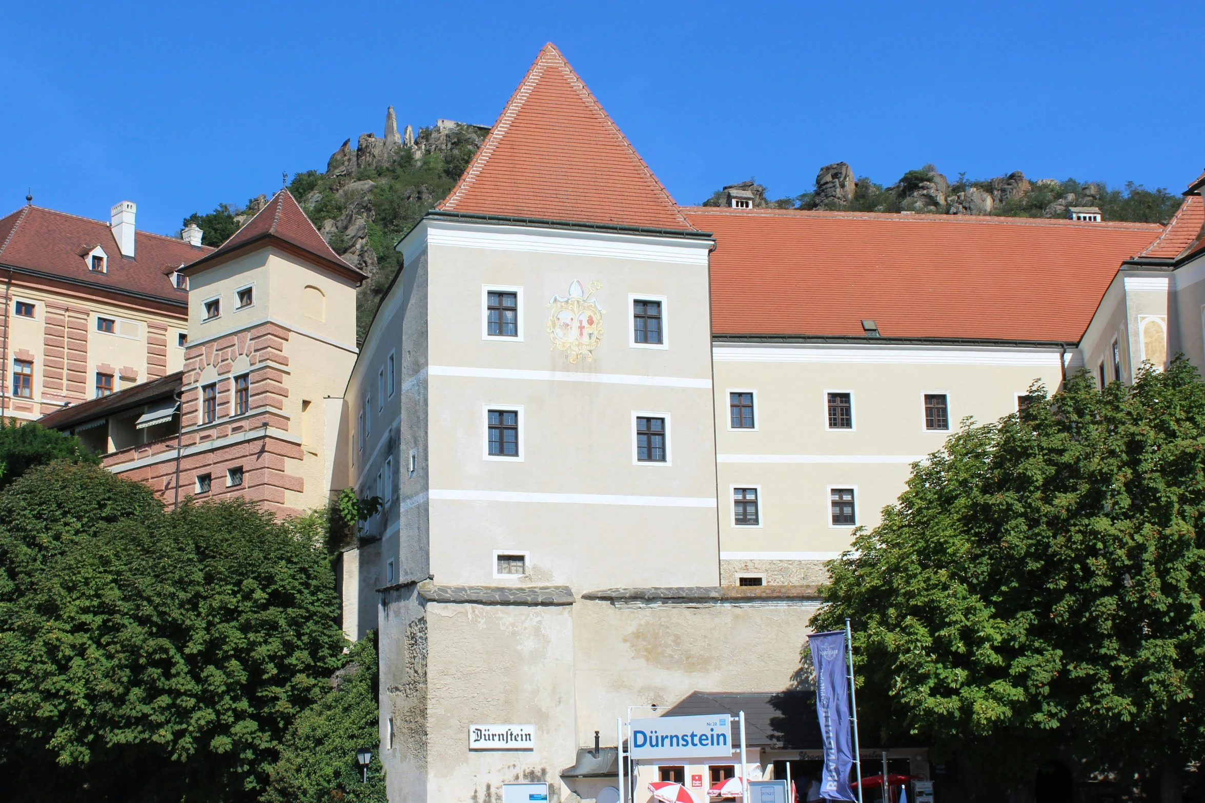 a clock tower with two people in it