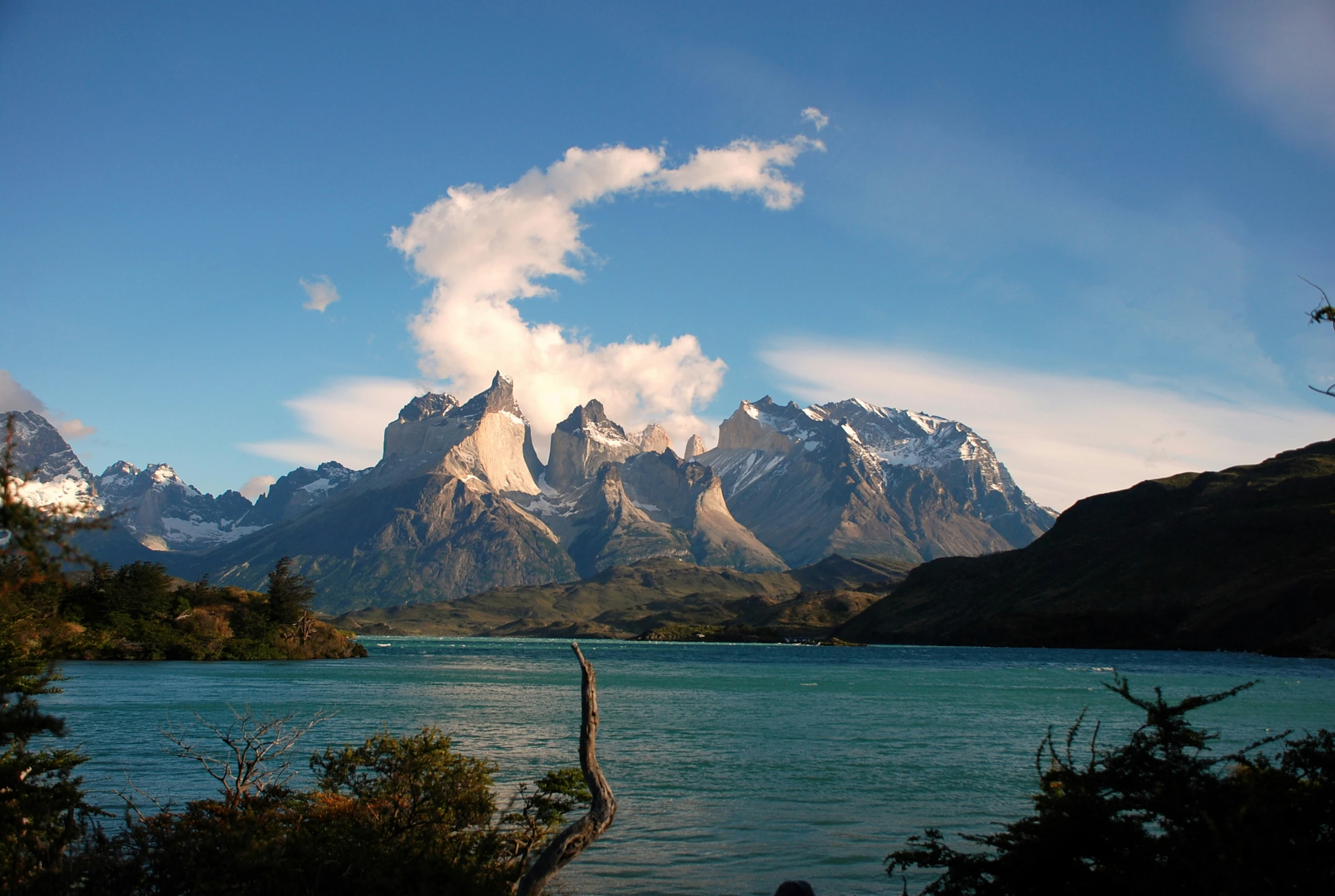 the view of a mountain range in a lake