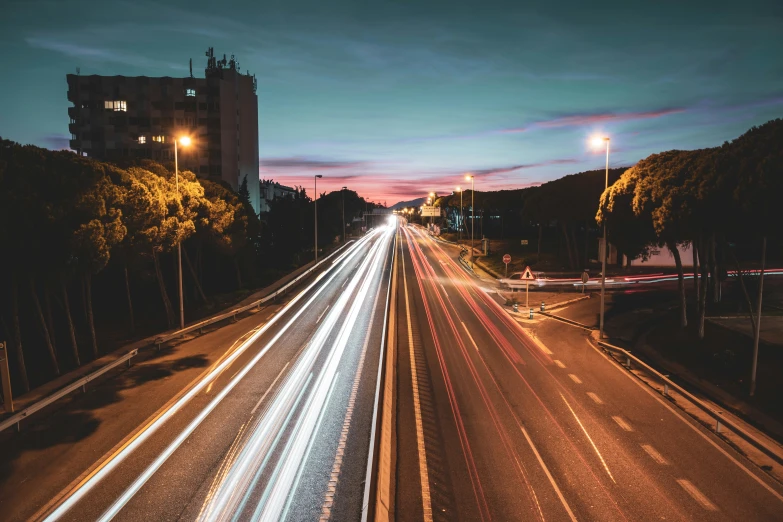 cars are shown travelling down a busy freeway