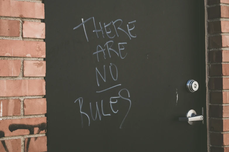 there is graffiti that reads'there are no rules '
