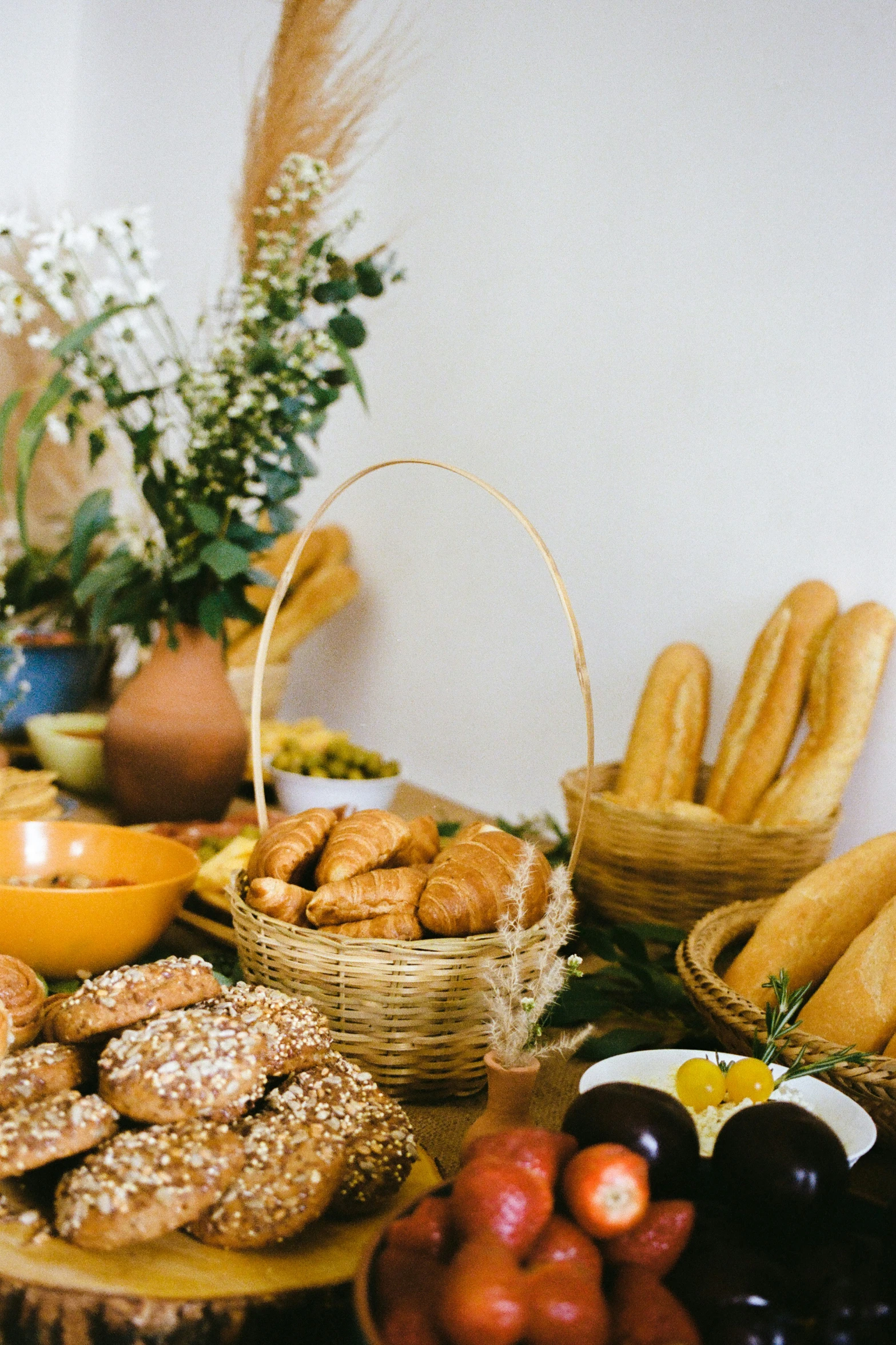a table filled with many different types of pastries