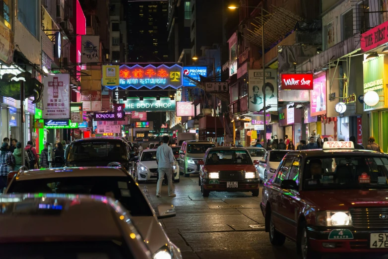 an image of car traffic at night in the city