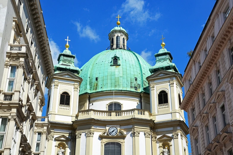 an ornate cathedral with two towers on it's side